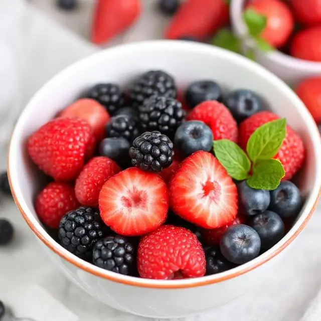 A bowl of fresh, vibrant berries.